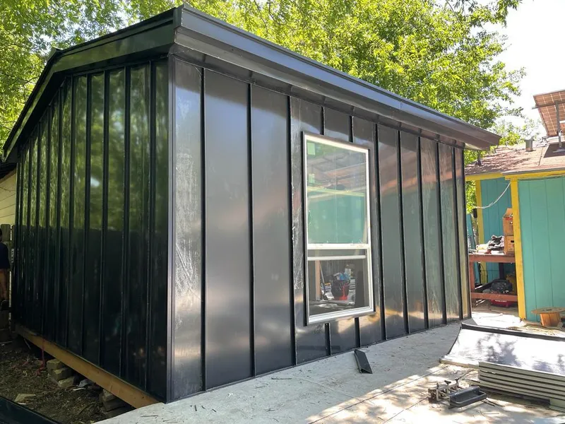 Black standing seam metal wall panels for Metal Roof Installation in Richfield